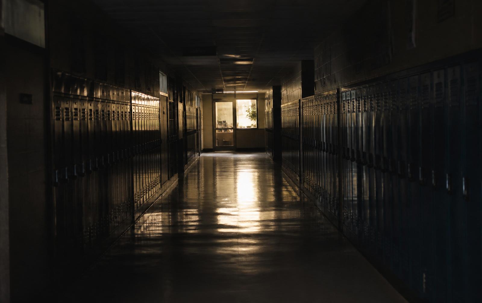 An empty school hallway before the building fills.